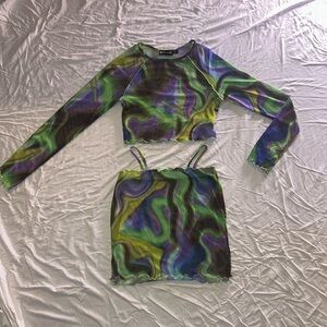 Pretty little thing 2 piece
Detailed with different greens/purples
Size 4